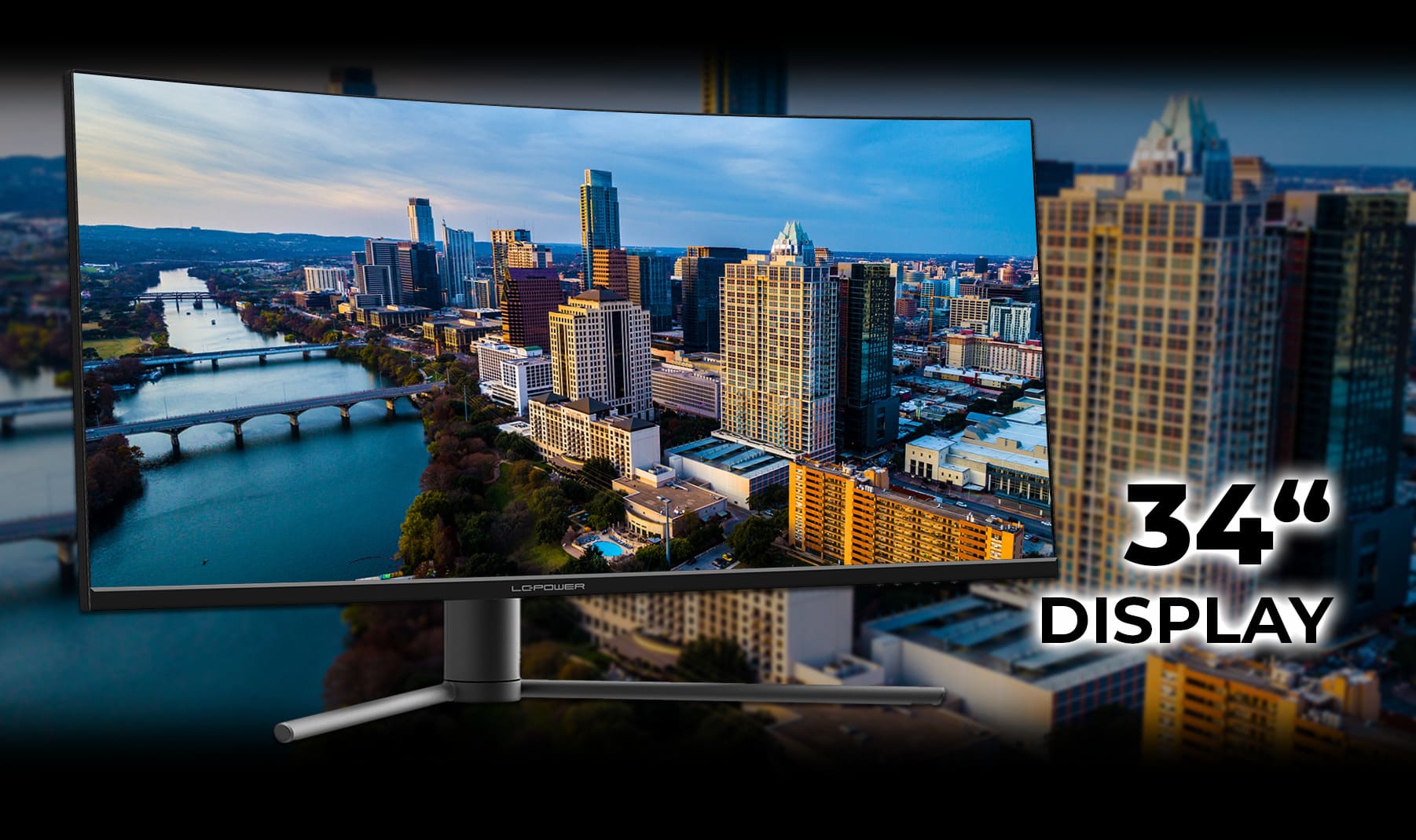 LC-M34-UWQHD-165-C Monitor mit 34 Zoll und einer Großstadt als Hintergrund